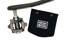 Load image into Gallery viewer, Nox Sox Small Pedal Cover next to a Shimano XTR Clipless Pedal